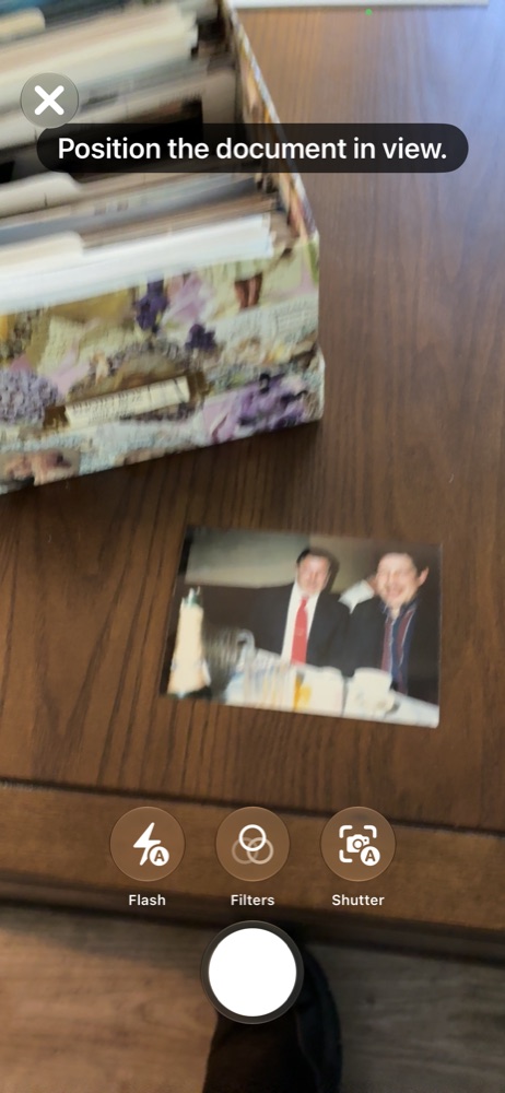 The scanner framing a photograph on a table